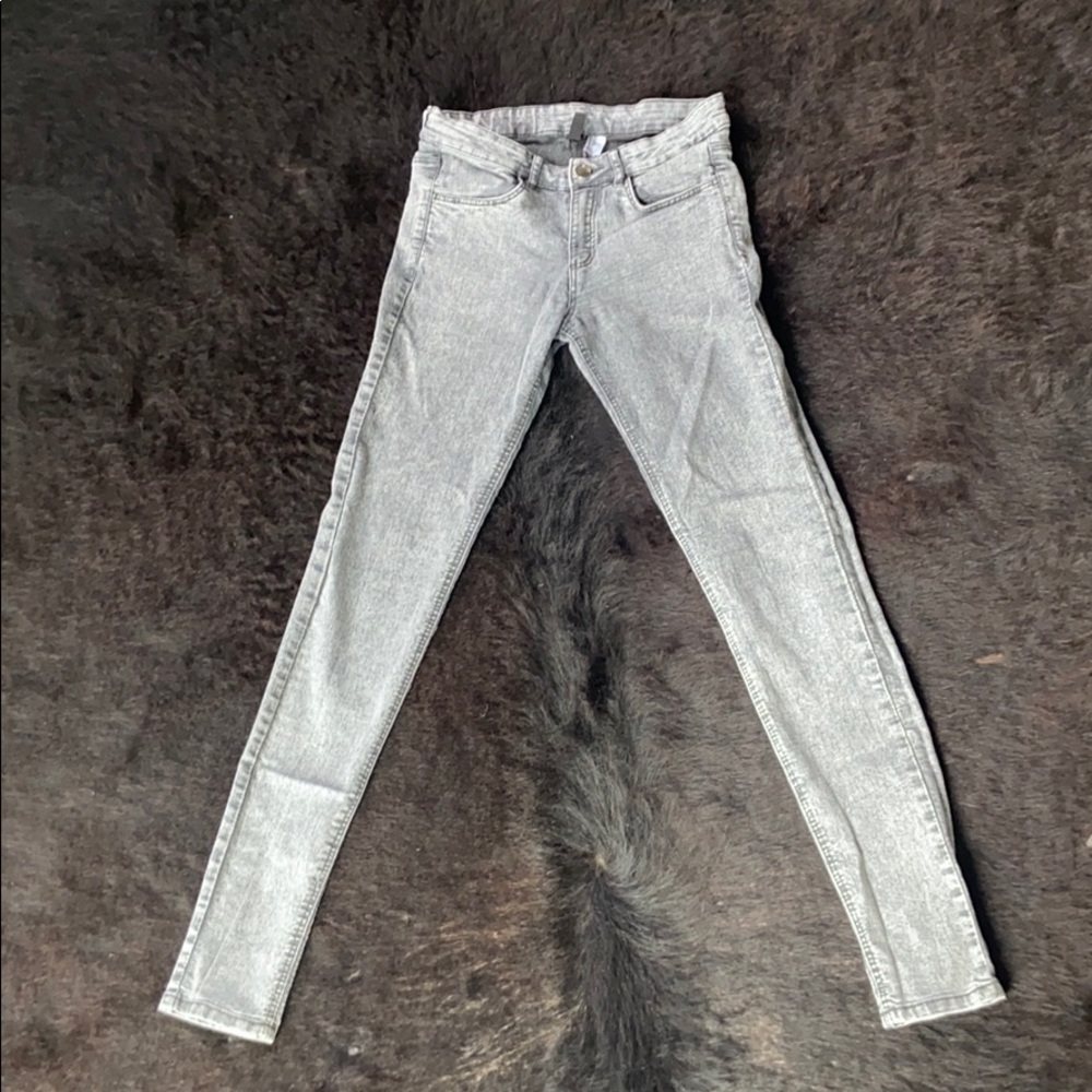 Divided acid wash jeans